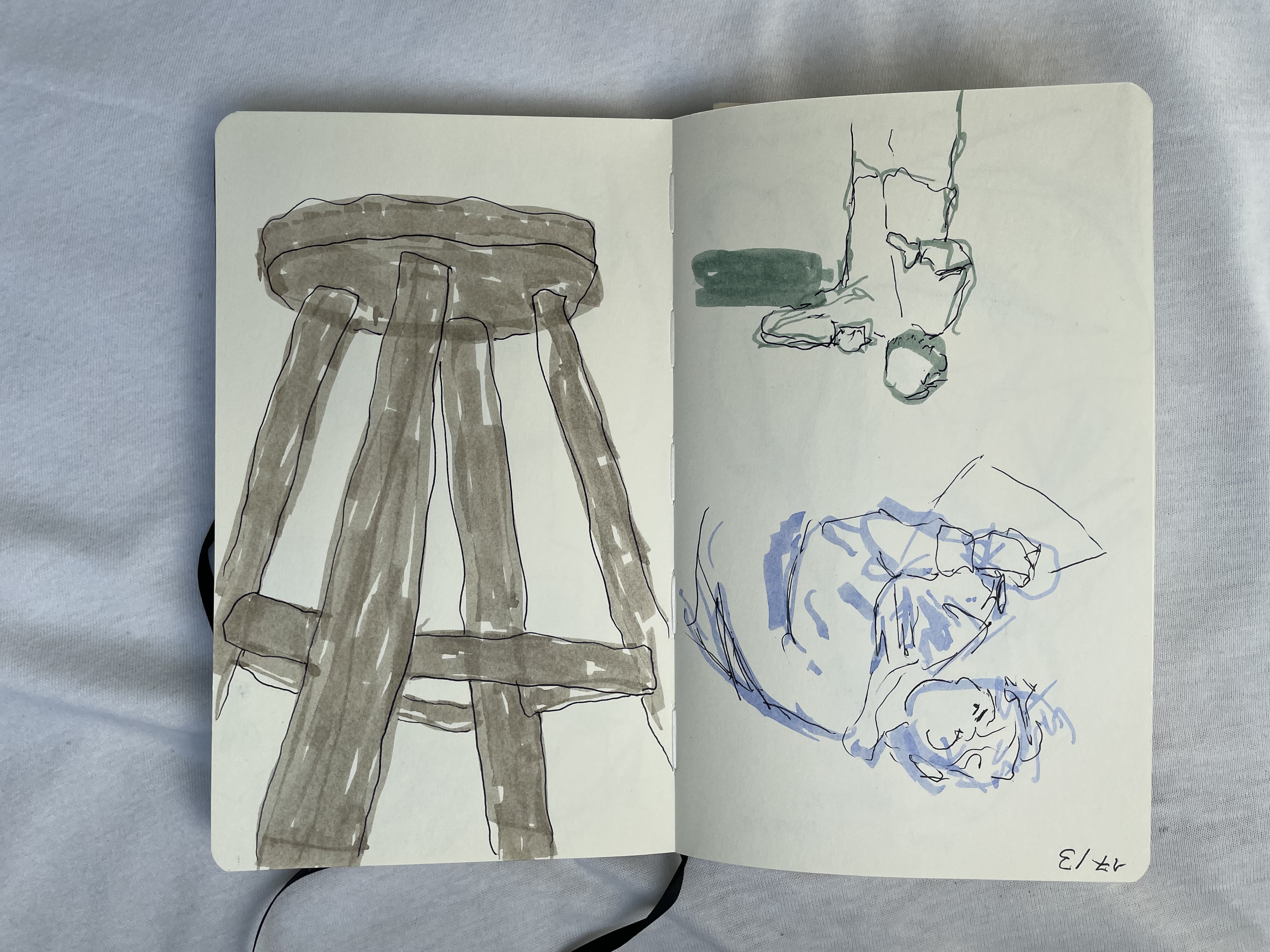 Sketchbook spread. The left page has two figure studies of a classmate and a teacher, first sketched in marker and then drawn over it in ink. The right page has a study of an upside down chair, with the same technique. These are drawn with my non-dominant hand.